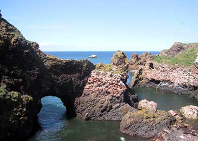 This picture shows that Dunbar Castle was built right over the sea