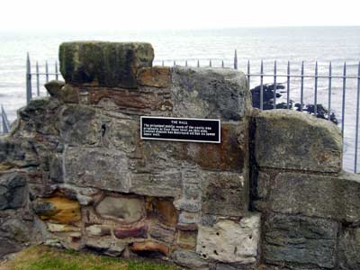 Remains of the Hall, the principal public room of the castle, destroyed by coastal erosion